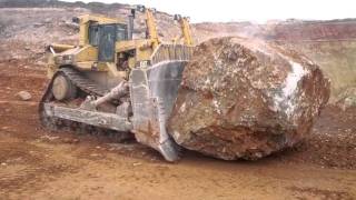 Caterpillar D11R pushing another massive rock [upl. by Notaes]