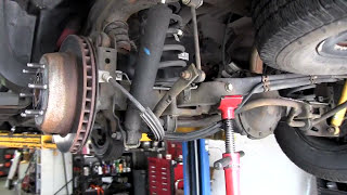 Replacement of Rear Shocks on a 2003 Chevrolet Avalanche 1500 l Sensen Shocks amp Struts [upl. by Ahsea696]