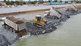 Fantastic Team Expert Driver Bulldozer Clearing Stone with Dump Truck Remove Stone into Deep Water [upl. by Neelyak819]