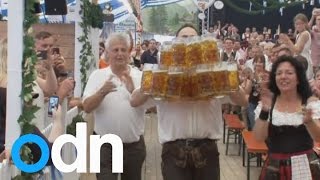 Man sets world record for carrying the most beers [upl. by Romney42]