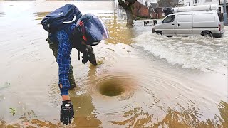 Unclogging Storm Drains to Drain Flooded Roads After Massive Rain [upl. by Tocci]