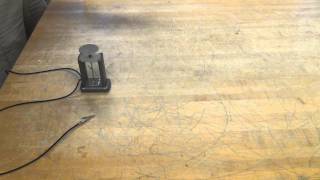 Charged Electroscope comparing Teflon and acrylic rods [upl. by Ardnosac]