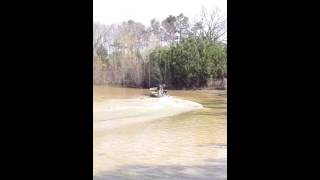 65 HP Long Tail on 14 Foot Jon Boat w One Person [upl. by Ridinger]