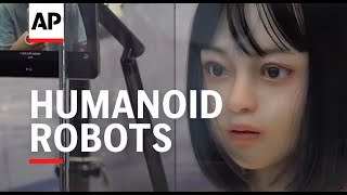 Humanoid robots powered by AI turn heads at the World Artificial Intelligence Conference [upl. by Anyg237]