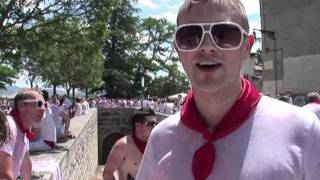 Huge crowds launch Spains Pamplona bullrun fiesta [upl. by Nivek956]