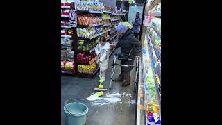 Elderly woman accidentally breaks milk bottle in store shorts [upl. by Olocin]