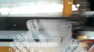 Laser engraving of a photo on glass a glass mirror [upl. by Kcira]