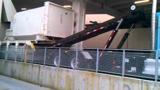 Lift Rail Roll Off Truck to Safely Service Double Stacking Compactors [upl. by Phillada]