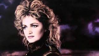 Bonnie Tyler  I Need a Hero Lyrics [upl. by Ruzich]