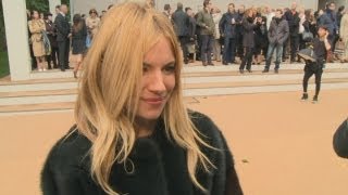 Sienna Miller at LFW Burberry show Working with boyfriend on advert was so funny [upl. by Comras]