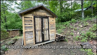 Covering a shed with palette wood [upl. by Kolk]