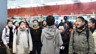 Loboc Childrens Choir sings IKAW at Madrid Airport [upl. by Badger]