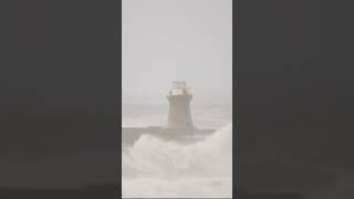 Towering Wave Slams into Lighthouse Unbelievable scaryocean lighthouse lighthousjob [upl. by Llennoc]