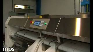 Primus IFF ironer with feeding folding and stacking [upl. by Shannon]