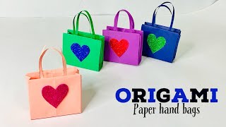 How to make a paper bags  DIY origami paper hand bags Easy stepbystep paper hand bags  making [upl. by Lebana]