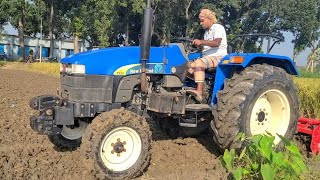 New Holland TT55 Tractor VideoNew Holland TT55 Tractor plowing the rotoragriculture video [upl. by Eelhsa916]