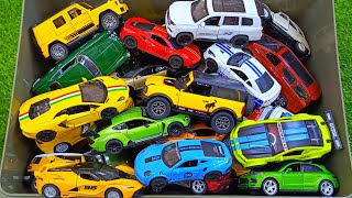 Box full of various miniature cars Peugeot Volvo Renault Hyundai Pagani Cadillac One DHL 195 [upl. by Rebma167]