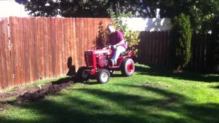 Wheel Horse plowing gardenn [upl. by Aseefan]