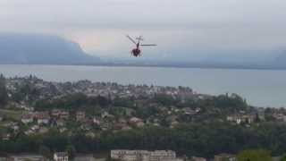 Vevey Lavaux  Traitement des vignes par hélicoptère à 8h du matin [upl. by Ahsatniuq584]