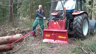 Steyr 370 Kompakt mit Uniforest Seilwinde beim Holz rücken winching firewood with a forestry winch [upl. by Alyda322]