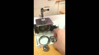 How to pull apart and reassemble the bobbin case area on a front loading sewing machine [upl. by Stedt]