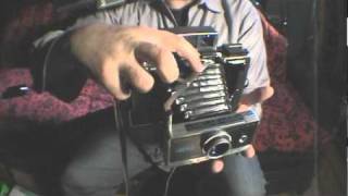 How to Open  Close Polaroid 100 Series Pack Camera [upl. by Gessner]