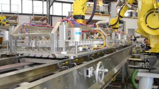 High Speed Cupcake Depanning With Four Fanuc Robots [upl. by Gnemgnok]