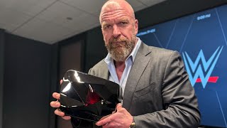 Triple H unboxes YouTube Red Diamond Play Button for 100 million subscribers [upl. by Artapoelc]