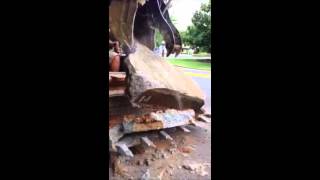 Bobcat 331 loading concrete sidewalk with Showtime Fabrication hydraulic thumb [upl. by Griggs]