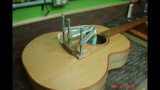 Gluing a bridge on an acoustic guitar [upl. by Layod255]