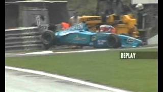 A marshal is dragged by Fisichellas Benetton at Spa in 2000 [upl. by Aleece508]