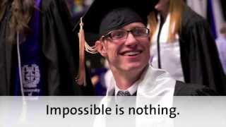 University of Portland student Sam Bridgman walks across the stage at graduation [upl. by Wallford]