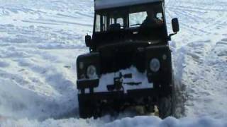 Land Rovers Series III playing in snowmpg [upl. by Ellynn450]