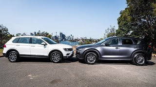 2019 Mazda CX5 vs 2019 Volkswagen Tiguan  Best Compact SUVs [upl. by Arjun]