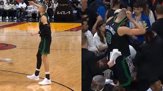 Kristaps Porzingis puts jersey over his head after scary non contact leg injury vs Heat 😬 [upl. by Athalie]