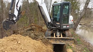 FIXING A POND DAM LEAK Start to finish Bobcat MINI Excavator [upl. by Akenaj601]