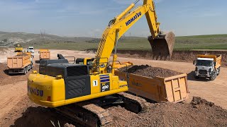 Komatsu Excavator loading double sided truck [upl. by Ainoyek]