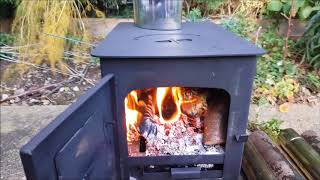 OUTBACKER Portable Wood Burning Tent Stove  Boiler test review [upl. by Adolfo666]