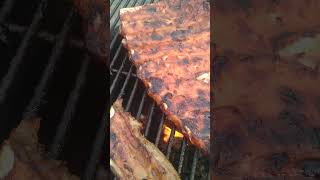 Sizzling BBQ pork ribs on the Beer keg ribs bbq grill [upl. by Beka170]