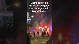 Metro bus lit on fire in Los Angeles after Dodgers win World Series [upl. by Aziram527]