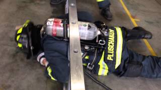 Firefighter fits through a ladder with an SCBA [upl. by Ewold]