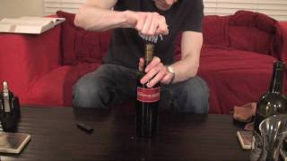 6 How to Open a Bottle of Wine with an AhSo  SuppleWinecom [upl. by Aleet]