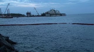 Operation starts to refloat illfated Costa Concordia [upl. by Ydnahs]