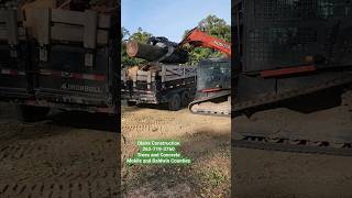 Kubota Skid Steer loading the dump trailer [upl. by Anerbas923]