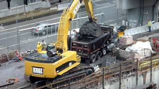 CAT 385C excavator loading a dump truck HD [upl. by Nosreve]