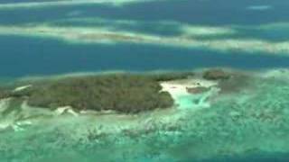 South Saddle Caye in Belize an aerial video tour [upl. by Anilesor531]