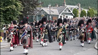 Drum Majors lead the massed Pipe and Drums marching to the 2023 Braemar Gathering in Scotland [upl. by Odie]