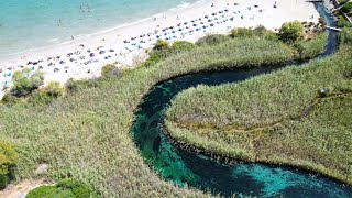 Beach Almyros Agios Nikolaos best beach 4K Drone Footage Crete Greece [upl. by Nnaeinahpets975]