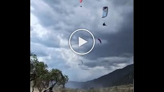 A strong storm blows paragliders into the air gleitschirm paragliding [upl. by Furmark405]