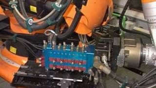 Handling of diecast parts with a KUKA robot [upl. by Lohman602]